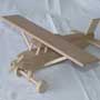 Avion Pilatus en bois naturel